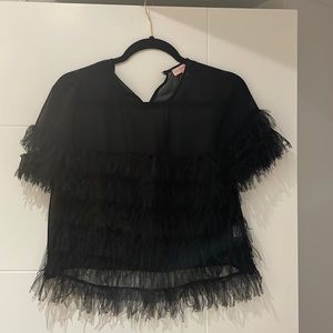 Cute top that you could either dress up or dress down!